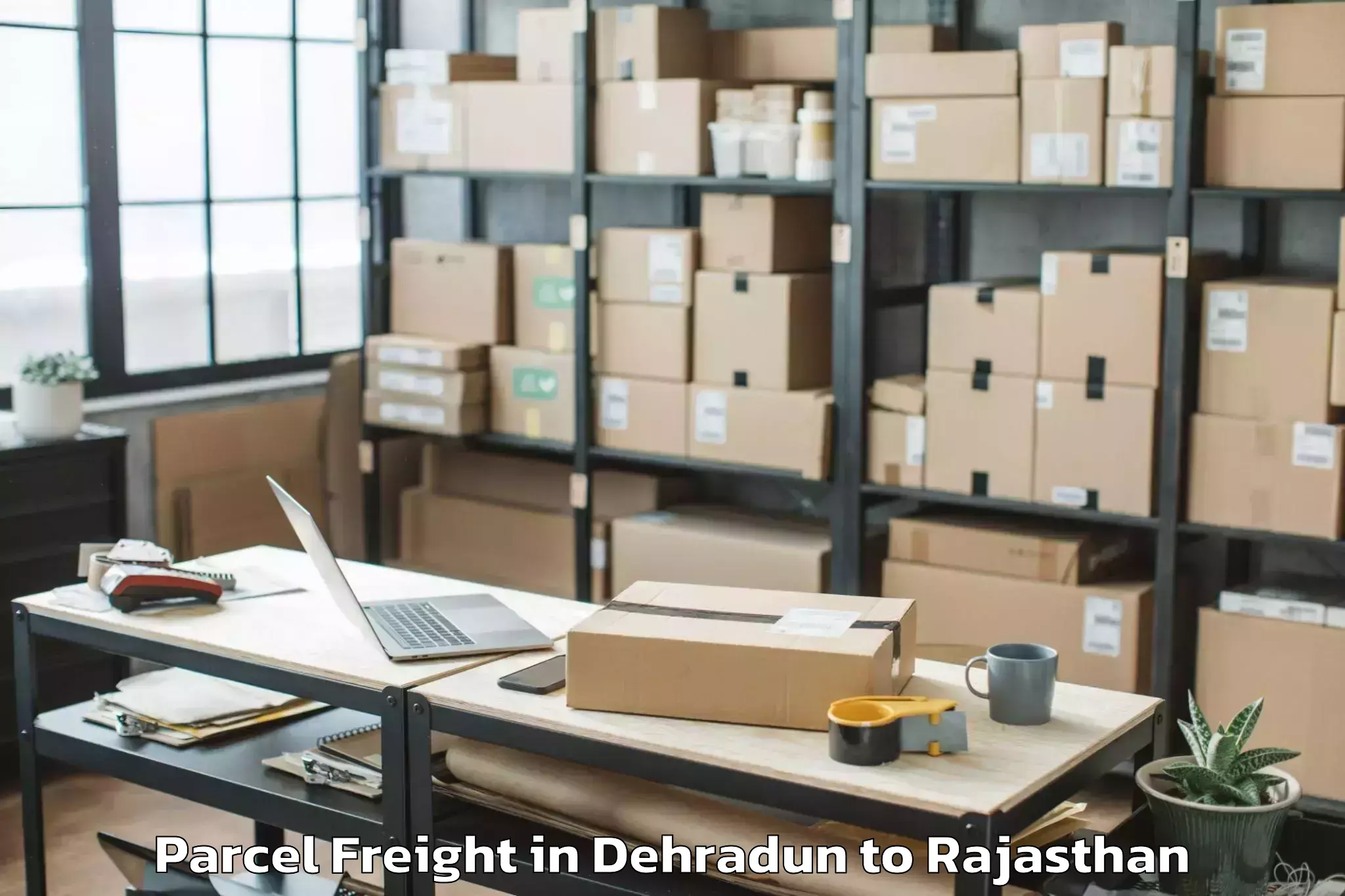 Leading Dehradun to Padampur Parcel Freight Provider